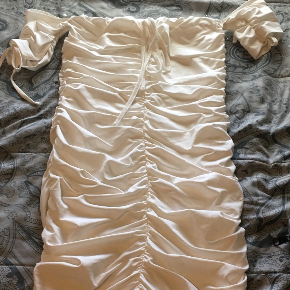 White fashion nova dress , off the shoulders